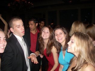 Me (middle) losing my shit, or rather, dancing like a normal person with my floormates at "COM Prom"